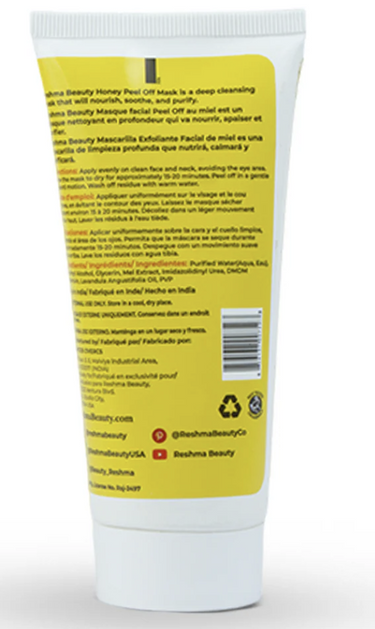 Back view of a skincare product tube with text and branding on a white background
